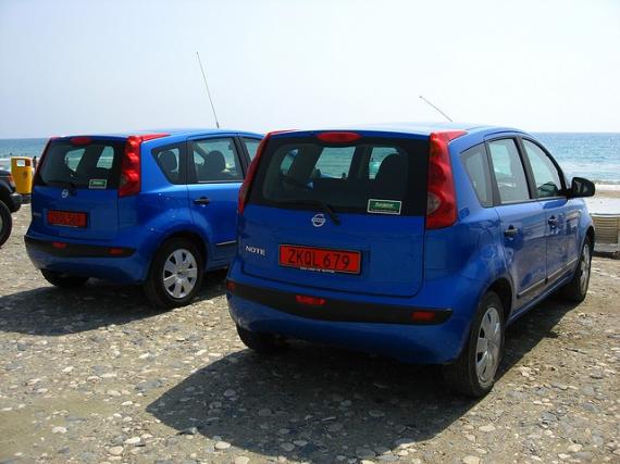 'Two Blue Nissan Notes - Kourion Beach, Kourion, Cyprus' - Zypern